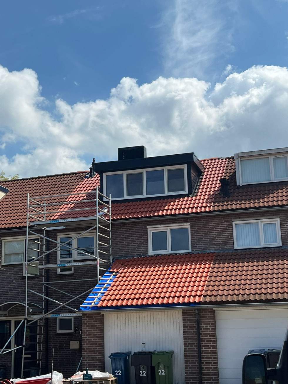 Opgeleverd dak: nieuwe pannen en afgewerkte dakkapel